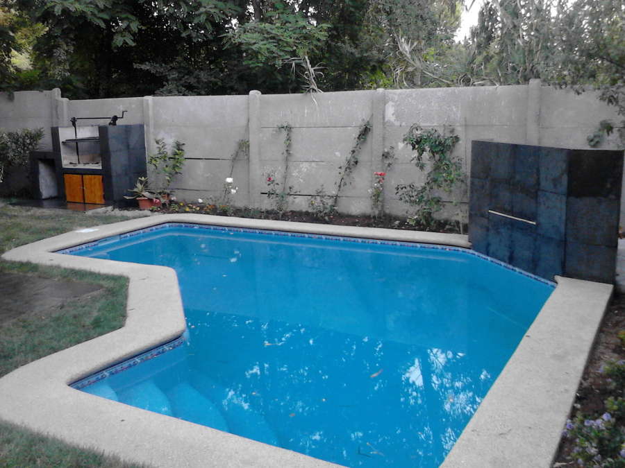 Piscina con cascada